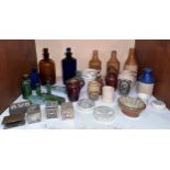 A collection of 19th century poison bottles, glassware, stoneware pottery ginger bottles and printed