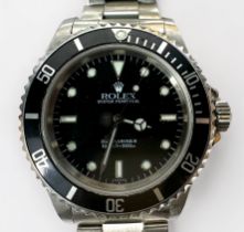 A Gents Stainless Steel Rolex Oyster Perpetual Submariner wristwatch, C.1999, model 14060, the black