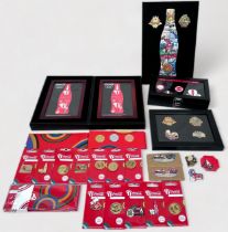 A collection of assorted Coca-Cola London 2012 enamel pin badges, comprising, two framed Coca-Cola