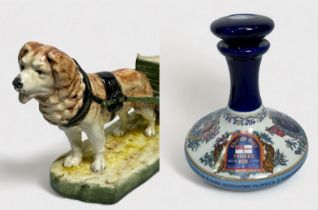 A Royal Royal Dux pottery figure of a dog pulling a cart, 34cm long, impressed number 12796, printed