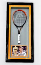An Andy Murray signed HEAD Radical 27 tennis racket, signed to grip, as part of a framed and