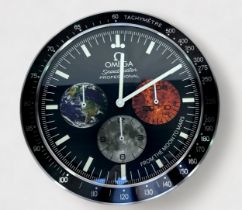 A wall clock, probably from an Omega AD, modelled as an Omega Speedmaster Professional ‘From the