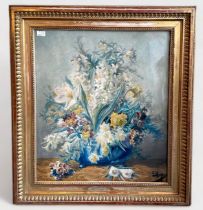 A still life study of flowers in a blue jardiniere, signed ‘Meyer’, watercolour, in carved gilt
