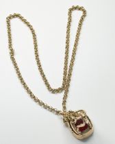 A 9ct yellow gold belcher chain, measuring approximately 23 inches in length, with 9ct yellow gold