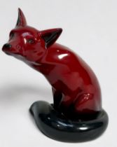 A Royal Doulton large Oxblood 'Flambe' model of a seated fox, impressed number 102, 23cm high