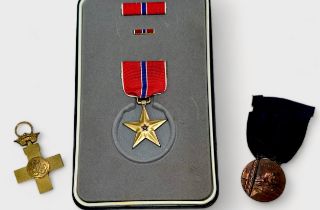 An Italian East Africa Campaign Medal 1936, A Spanish Cross of Military Merit (Civil War), and a