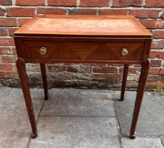 A Waring & Gillow stained mahogany writing desk, parquetry drawer, brass textured pulls, raised on