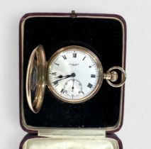 A 9ct gold cased half-hunter pocket watch by J. W. Benson, the white enamel dial with Roman numerals