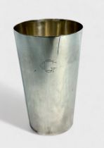 A late Victorian/Edwardian Indian silver-plated beaker of tapering cylindrical form, with engraved