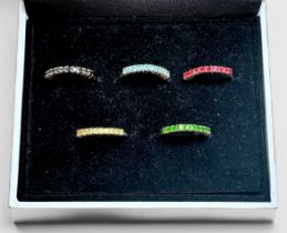 A set of five 9ct gold rings, each set with ten gemstones, spinel, blue topaz, Russian Diopside,