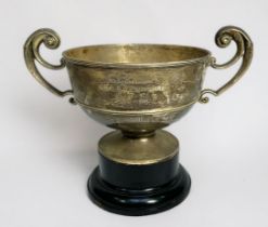 An Edwardian twin-handled silver trophy by George Nathan & Ridley Hayes, with inscription to