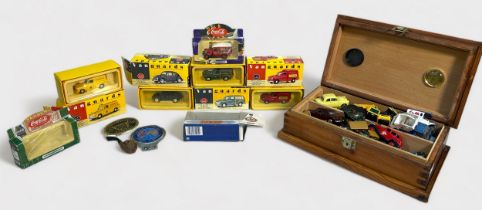 Four Vanguard's boxed scale model vans and various 'loose' cars, together with a Ascension Island