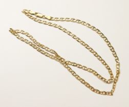 A 9ct yellow gold flat marine link chain, measuring approximately 24 inches in length, weighs 11.9