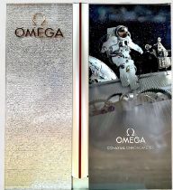 A metal Omega authorised dealer shop display sign, advertising ‘Omega Co-Axial Chronometer’, with an