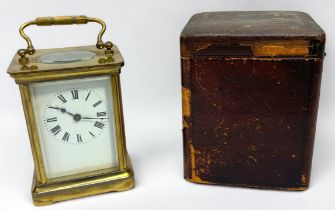 An early 20th Century French brass cased carriage clock by Duverdrey & Bloquel, the white enamel