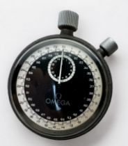 An Omega stopwatch, with black enamel dial, white outer track, subsidiary dial, top winding stem and