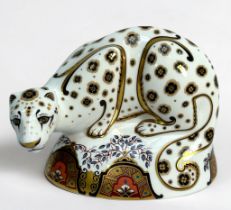 A Royal Crown Derby porcelain paperweight, 'Snow Leopard,' 2006, gold stopper, unboxed, 13.5cm high