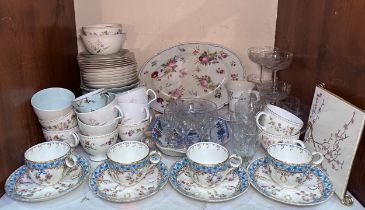 Four 19th century fluted cups and saucers with polychrome floral painted decoration, together with