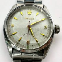 A vintage stainless steel Rolex Oyster, model 6480, C.1955, possibly earlier, the white waffle ‘