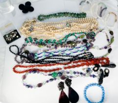 A quantity of pearl necklaces, beads, bangles, earrings etc.