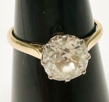An 18ct yellow gold solitaire diamond ring, eight-claw set with a Victorian cut diamond, estimated