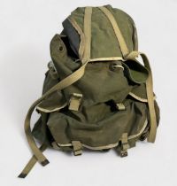 A 1940s War Department issue Bergen together with a WD webbing belt and pounches, (2)