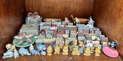 A large collection of Wade ceramics, comprising, more than forty Wade Whimsey-on-Why cottages,