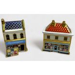 Two Royal Crown Derby porcelain paperweights, 'The China Shop,' and 'The Greengrocer,'