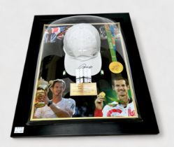 An Andy Murray signed white Nike cap, signed to visor, as part of a framed montage featuring a