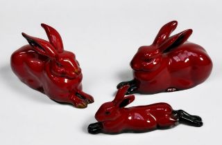 Three Royal Doulton Flambe models comprising Hare Crouching 2x Style Three (one 1904-2004