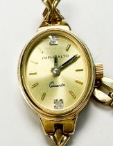 A 9ct yellow gold Imperialto wristwatch on 9ct gold link bracelet, the oval gold dial with batons