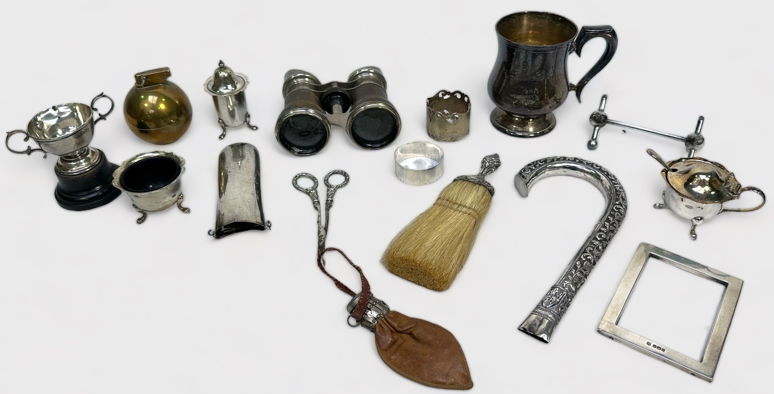 A silver-mounted dusting brush, scissors, spectacle case, napkin ring, trophy cup, etc, together