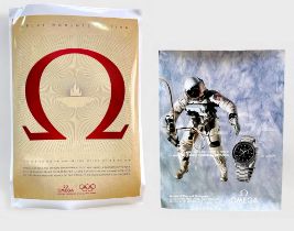 Four various Omega wristwatch posters, two depicting close-ups of Omega watches, including, an Omega