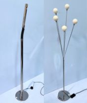 A modern chrome standard lamp with with five individual rods with spherical opaque white glass