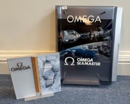 An Omega watches authorised dealer 3D display stand advertising Omega Seamaster, decorated with a