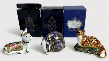 Three Royal Crown Derby porcelain paperweights, Holly Donkey Foal Signature Edition, Badger and