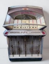 A Wurlitzer 2504 Jukebox circa 1961, coin operated to take US and Netherlands coins (supplied),