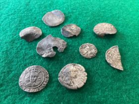 Nine silver coins - one Roman, one foreign medieval (which is possibly Spanish) and seven English