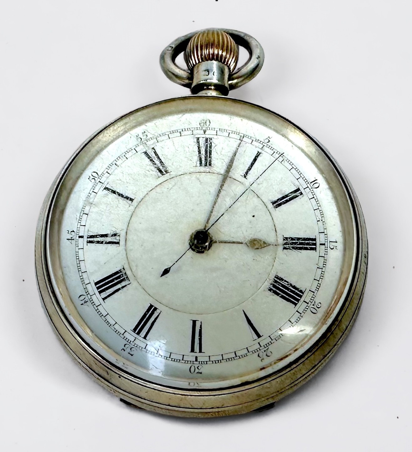 A late 19th century silver-cased open-face pocket watch, the white enamel dial with Roman numerals