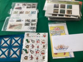 Approximately 50 Royal Mail special edition stamp presentation packs each containing anything from