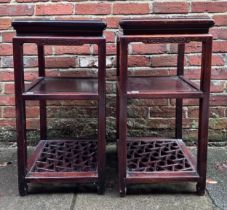 A pair of early 20th century Chinese Rosewood three-tier occasional tables, of square section with