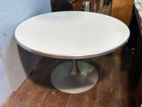 An Eero Saarinen 'Tulip' style circular table, with white top, raised on brushed aluminium base, top