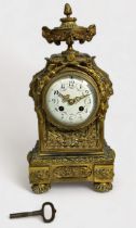 A 19th Century Ormolu mantel clock, with eight-day movement striking a bell, maker's name A.D.