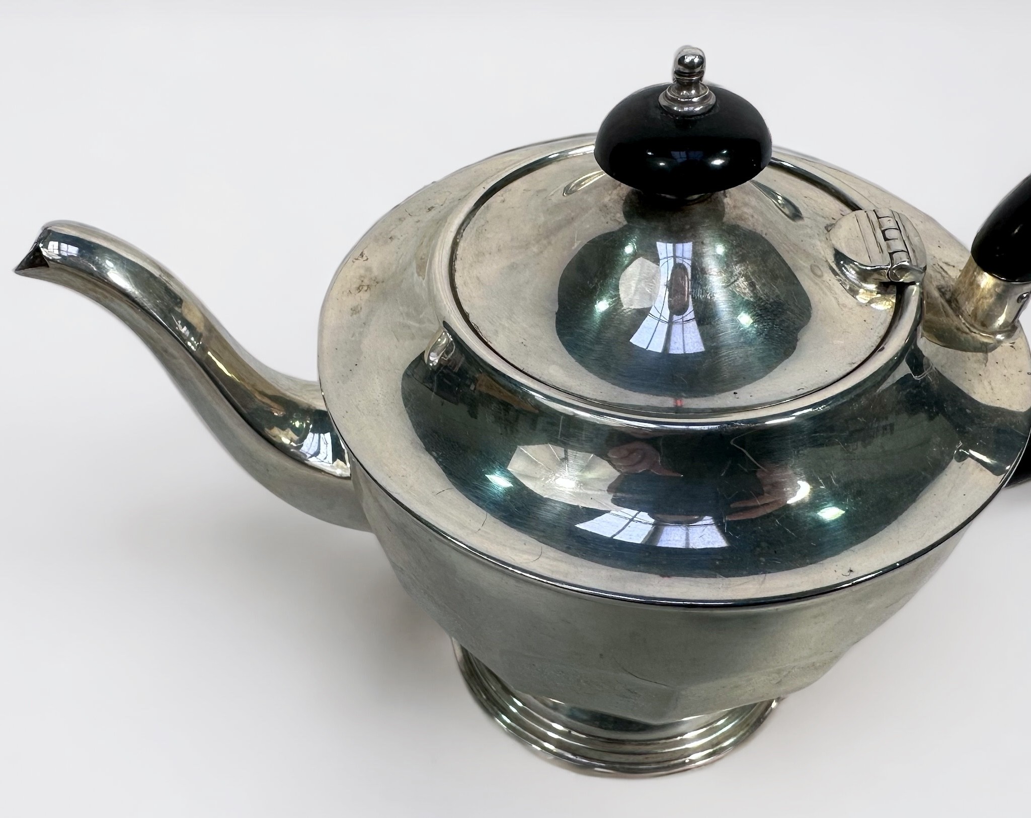 A George V three-piece silver teaset of circular panelled form on circular spreading foot, the - Image 2 of 2