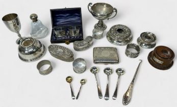 A collection of assorted silver wares comprising two inkwells (AF) a cigarette case by Joseph