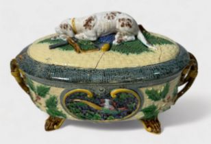 A 19th century Minton Majolica game pie tureen, cover and liner, of oval form with rustic handles,