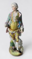 A large 19th century Meissen porcelain figure of gentleman 'dandy' with tricorn hat under his left