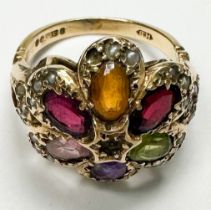 A 9ct gold dress ring, set with 6 x various coloured faceted stones, with small seed pearls