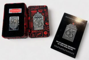 A Zippo 65th Anniversary lighter, 1997 limited edition collectible, chrome lighter with applied