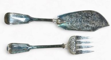 A pair of Victorian sliver fish servers by Chawner & Co. With pierced and foliate declaration,